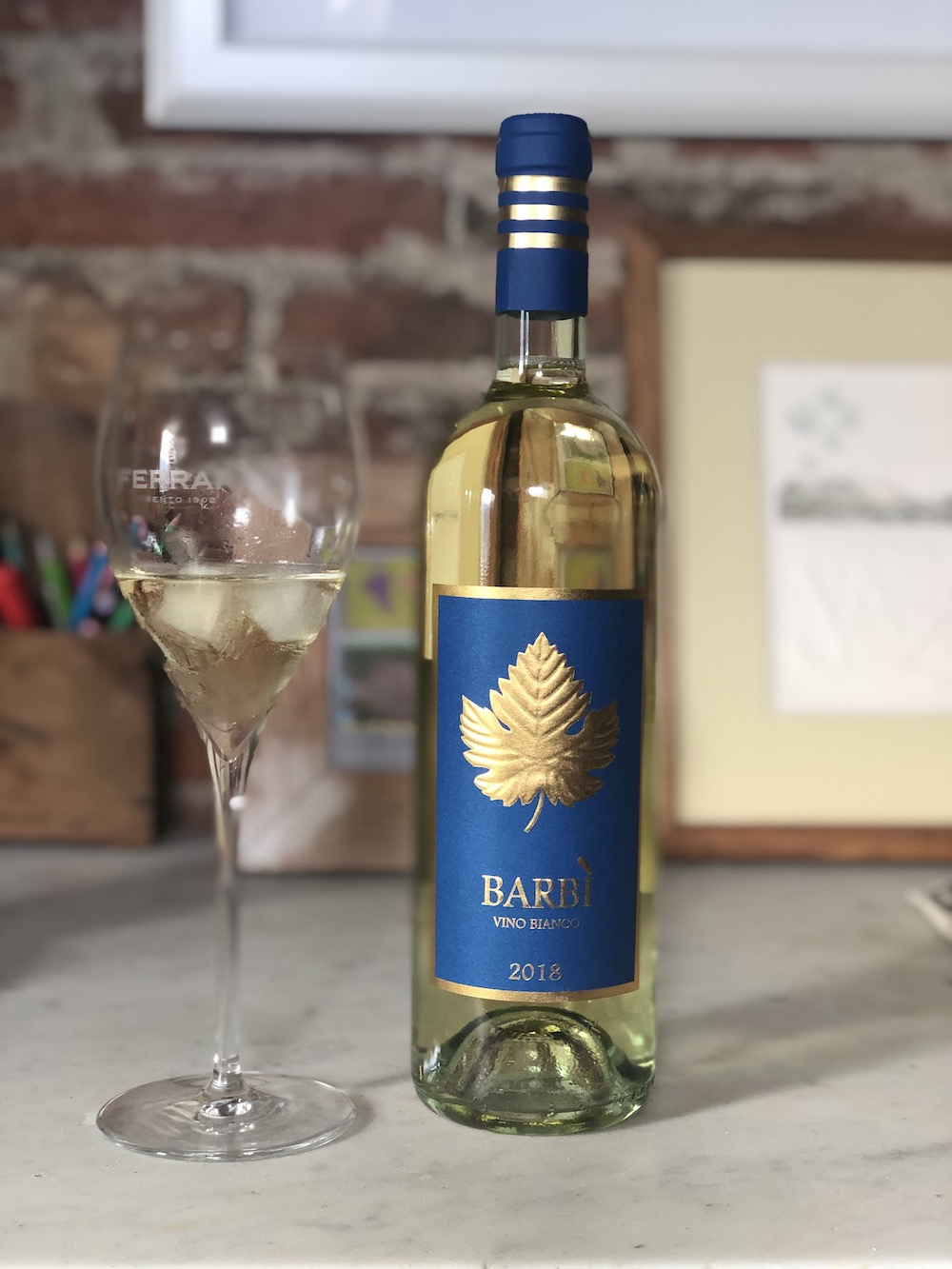 Bottle of white wine Barbì