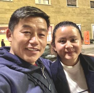 Indispensable Assistance team members providing support during a cooking experience—smiling, focused, and making everything run smoothly